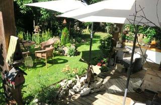 Wohnung kaufen in 5202 Neumarkt am Wallersee, Stilvoller 2,5-Zimmer-Gartentraum in Neumarkt am Wallersee