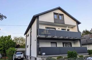 Mehrfamilienhaus kaufen in 4052 Ansfelden, Gepflegtes Mehrfamilienhaus in Ansfelden: 240 m² WNF, Doppeltgarage und großer Garten!