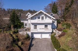 Haus kaufen in 9201 Krumpendorf, Stilvoll wohnen mit Seeblick, Garten, Balkon und Doppelgarage in Krumpendorf.