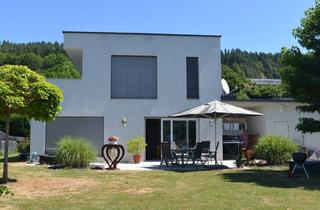 Einfamilienhaus kaufen in Wörthersee, 9210 Pörtschach am Wörther See, Das Leben am Wörthersee genießen: Schlichtes Einfamilienhaus mit Doppelcarport in grüner Umgebung zu verkaufen