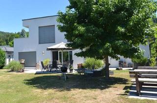 Einfamilienhaus kaufen in Wörthersee, 9210 Pörtschach am Wörther See, DEIN neues Zuhause am Wörthersee: Gemütliches Einfamlienhaus mit Doppelcarport in schöner Wohngegend