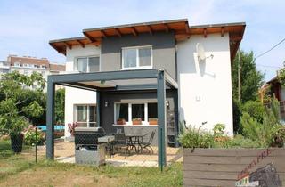 Einfamilienhaus kaufen in 1030 Wien, Modernes Einfamilienhaus mit Garten, Terrasse & Pool im 3. Bezirk – Wohnen im Grünen nahe dem Hauptbahnhof