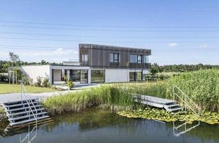 Villen zu kaufen in 2821 Lanzenkirchen, Architektur trifft See – luxuriöses Refugium mit Privatsauna & Atrium