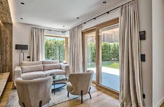 Maisonette kaufen in 6372 Oberndorf in Tirol, Garten-Maisonette-Wohnung mit Chalet-Charme und Bergpanorama