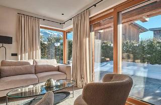 Maisonette kaufen in 6372 Oberndorf in Tirol, Garten-Maisonette-Wohnung mit Chalet-Charme und Bergpanorama