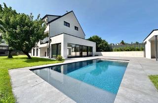 Villen zu kaufen in 2345 Brunn am Gebirge, Villa mit Chic und Charme zwischen Himmel und Wien und mit Lift I Skylineblick auf Wien I Salzwasserpool I Designerküche I