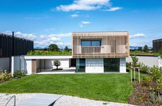 Villen zu kaufen in Golf Club Föhrenwald- Linsberg, 2821 Lanzenkirchen, Luxus am Wasser - Architekturvilla mit Atrium, Sauna & direktem See Zugang