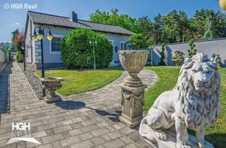 Einfamilienhaus kaufen in 2405 Bad Deutsch-Altenburg, 2405 Bad Deutsch-Altenburg Stilvoll wohnen - modernisiertes Einfamilienhaus im Bungalow-Stil inkl. Fitness- und Wellnessbereich