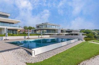 Wohnung kaufen in 9580 Drobollach am Faaker See, Luxuriöse Gartenwohnung in direkter Seelage