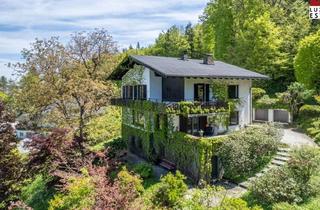 Villen zu kaufen in 9082 Maria Wörth, Panorama-Landhaus über der Bucht mit Badeplatz-Option & Baulandreserve