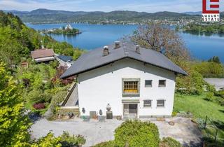 Villen zu kaufen in 9082 Maria Wörth, Panorama-Landhaus über der Bucht mit Badeplatz-Option & Baulandreserve