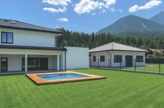 Doppelhaushälfte kaufen in 9170 Ferlach, Ihr neues Zuhause mit beheizbarem Pool - stilvoll, nachhaltig, außergewöhnlich