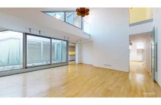 Wohnung kaufen in 1040 Wien, Helle Dachgeschosswohnung mit Terrassen und Blick auf die Karlskirche