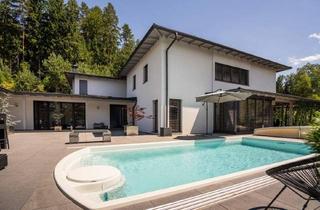 Mehrfamilienhaus kaufen in 9150 Bleiburg, Exklusives Mehrfamilienhaus mit 3 Wohneinheiten - moderne Architektur trifft flexible Nutzung!