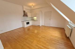 Wohnung kaufen in Halbgasse, 1070 Wien, Befristet vermietete 2-Zimmmer- Dachgeschosswohnung - Garten-/Hofseitig ausgerichtet!