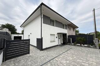Doppelhaushälfte kaufen in 2491 Steinbrunn, Exklusive Doppelhaushälfte mit Luxusausstattung und Garage