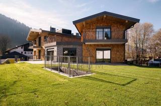 Wohnung kaufen in 6370 Kitzbühel, Möbliertes Designer Chalet am Schwarzsee von Kitzbühel