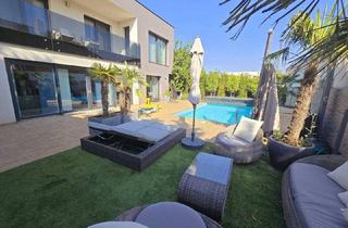 Haus kaufen in 2333 Leopoldsdorf, Traumhaft LUXURIÖS AUSGESSTATTETES SMART EFH in Leopoldsdorf: Wfl. 196m², 6 Zimmer, Balkon & Terrasse! + PHOTOVOLTAIK ANLAGE mit STROMSPEICHER + beheizter POOL + GARAGE + GRILLPLATZ +