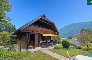 Villen zu kaufen in 9601 Arnoldstein, Charmantes Holz-Wohnhaus in Ruhelage am Fuße des Dreiländerecks mit Garten, Balkon & Carport für 205.000 Euro