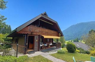Villen zu kaufen in 9601 Arnoldstein, Charmantes Holz-Wohnhaus in Ruhelage am Fuße des Dreiländerecks mit Garten, Balkon & Carport für 205.000 Euro