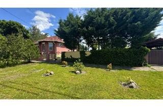 Haus kaufen in 2425 Nickelsdorf, SOMMERAKTION in Ungarn bei der Österreichischen Grenze! Urlaubsfeeling im Alltag! Wunderschöner, uneinsehbarer, großzügiger Garten | mit Pool | mit Terrasse, 2 Carports und Brunnen! | niedrige Betriebskosten | perfekte Raumaufteilung |