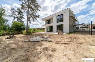 Einfamilienhaus kaufen in 2231 Strasshof an der Nordbahn, ERSTBEZUG - Modernes Einfamilienhaus mit 148 m² Wohnfläche, Balkon, Terrasse & 2 PKW-Stellplätzen in Strasshof – belagsfertig!