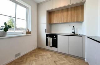 Wohnung kaufen in Rainerstraße 20, 4910 Ried im Innkreis, Stylisch wohnen im Herzen von Ried - mit Designer-Küche