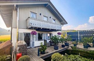 Einfamilienhaus kaufen in 9560 Feldkirchen in Kärnten, Ruheoase mit High End Wellness Wintergarten und parkähnlichem Grundstück!