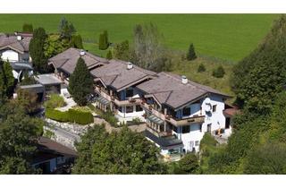 Mehrfamilienhaus kaufen in 6382 Kirchdorf in Tirol, Exklusives Wohnensemble mit drei stilvollen Mehrfamilienhäusern