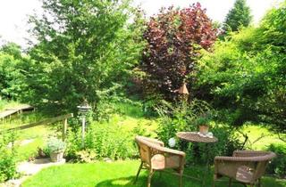 Wohnung kaufen in 5202 Neumarkt am Wallersee, Stilvoller 2,5-Zimmer-Gartentraum in Neumarkt am Wallersee