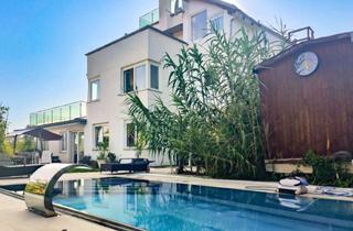 Villen zu kaufen in 9201 Krumpendorf am Wörthersee, Panoramablick trifft Luxus: Exklusive Villa mit Pool und Seeblick in Krumpendorf.