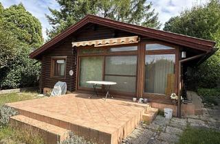 Haus kaufen in 7202 Bad Sauerbrunn, Blockbohlenhaus mit Wintergarten und Doppelgarage auf Eigengrund - mit Seebenützung zu verkaufen