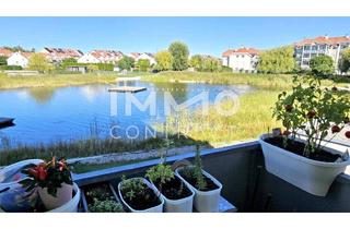 Wohnung kaufen in 2333 Leopoldsdorf, Jeden Tag Urlaubsfeeling: Exklusive 2-Zimmer-Wohnung mit großem Balkon & Seeblick