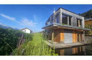 Einfamilienhaus kaufen in 6094 Axams, ErLeben Sie Natur pur - Exklusives Traumhaus mit Schwimmteich