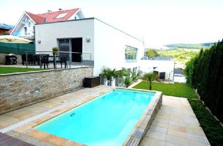 Villen zu kaufen in 3400 Klosterneuburg, Architect-designed villa with heated saltwater pool - distant views and forest access - "a must see"