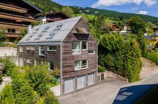 Haus kaufen in 5753 Saalbach, Extravagantes Wohnhaus mit vier Einheiten in Toplage