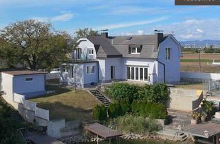 Einfamilienhaus kaufen in 2333 Leopoldsdorf, Exklusives Seehaus mit Eigenem Steg