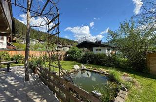 Einfamilienhaus kaufen in 6384 Waidring, Neubau mit guter Raumaufteilung, Bergblick und eigenem Fischteich im Garten