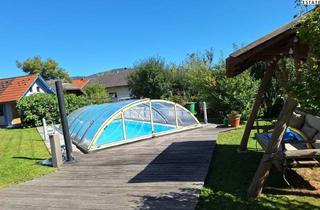 Villen zu kaufen in 9130 Wabelsdorf, 2-Familienhaus in Klagenfurt Land mit Wintergarten & Pool