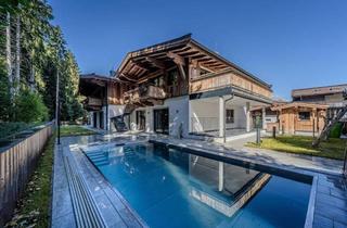 Einfamilienhaus kaufen in 6306 Söll, Wunderschönes Doppelhaus mit Gewerbefläche und Outdoor-Pool in sehr ruhiger Lage