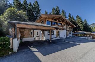 Einfamilienhaus kaufen in 6306 Söll, Wunderschönes Doppelhaus mit Gewerbefläche und Outdoor-Pool in sehr ruhiger Lage