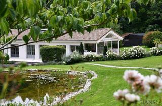 Haus kaufen in 3012 Wolfsgraben, Luxus-Chalet in Wolfsgraben mit beeindruckendem Innenpool und exzellenter Gartengestaltung