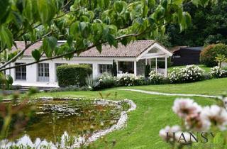 Haus kaufen in 3012 Wolfsgraben, Luxus-Chalet in Wolfsgraben mit beeindruckendem Innenpool und exzellenter Gartengestaltung