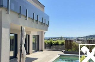 Einfamilienhaus kaufen in 4181 Oberneukirchen, Zuhause ankommen: Traumhaus mit Salzwasserpool und moderner Gartengestaltung.