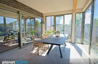 Haus kaufen in 7132 Frauenkirchen, Neuwertiger Bungalow in Frauenkirchen – mit beheiztem Wintergarten & Kamin