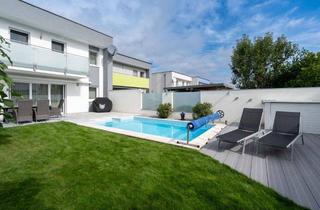Doppelhaushälfte kaufen in 4063 Rutzing, Traumhafte Doppelhaushälfte in Hörsching– Modernes Wohnen mit Pool, Kamin und großzügigem Garten!