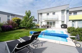Doppelhaushälfte kaufen in 4063 Rutzing, Traumhafte Doppelhaushälfte in Rutzing – Modernes Wohnen mit Pool, Kamin und großzügigem Garten!