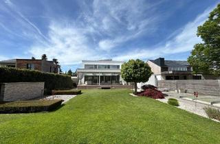 Einfamilienhaus kaufen in 4600 Wels, Exklusives Einfamilienhaus mit Pool und gemütlichem Wohnambiente in Wels