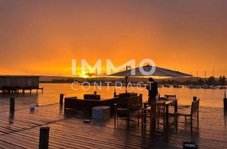 Immobilie kaufen in Hafen, 7093 Jois, Bootshaus mit Garage, Kran, Wohnflächen und Terrassen mitten am See