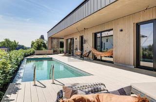Einfamilienhaus kaufen in 5232 Kirchberg bei Mattighofen, Preisreduktion! DESIGNBUNGALOW MIT SONNIGEM POOL UND HOCHWERTIGSTER AUSSTATTUNG